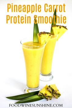 two glasses filled with pineapple carrot protein smoothie