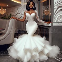 a woman in a wedding dress posing for the camera