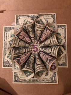 dollar bills arranged in the shape of a flower