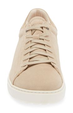 Designed with a contoured, shock-absorbing cork footbed, this supple suede sneaker is perfect for all-day wear in clean-cut style. Lace-up style Removable insole with arch support Leather upper and lining/rubber sole Made in Portugal Comfortable Low-top Sneakers With Cork-bed Midsoles, Comfortable Suede Sneakers With Perforated Toe Box, Men Birkenstock, Sneaker Men, Sand Castle, Fabric Gift Bags, Casual Lace, Suede Sneakers, Clean Cut