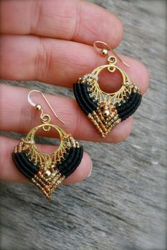 black and gold beaded earrings with filigrees