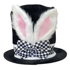 a black hat with white and pink bunny ears on the top has a checkered bow tie