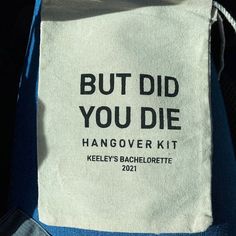 a bag with the words but did you die hangover kit on it's side