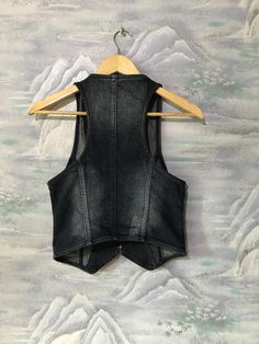 "Vintage Extra Small Size Vest Denim Vest Women Jeans Vest Blue Denim Vest Fitted Waistcoat Jeans Waistcoat Extra Small to Small Waistcoat Label size: 34 Estimated size: XS/S Measurements (lying flat): Length: 19,2\" - 49 cm Pit to pit: 14,5\" - 37 cm Waist: 13,7\" - 35 cm Please check measurements to insure a proper fit. Remember to allow yourself some extra room for movement. You can compare these with something from your closet that fits you well. This vest will come to you freshly laundered Trendy Denim Blue Vest Outerwear, Trendy Denim Vest Top For Fall, Trendy Fall Denim Vest Top, Trendy Denim Vest Outerwear, Denim Blue Denim Vest Outerwear, Medium Wash Denim Vest Top For Fall, Fall Medium Wash Denim Vest Top, Medium Wash Denim Vest Outerwear, Trendy Fitted Denim Top For Winter