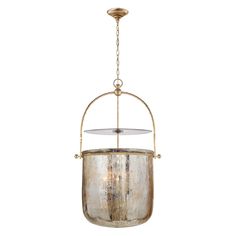 an old - fashioned hanging light fixture with a glass dome and metal chain around it