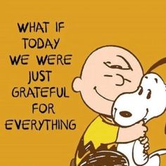 a yellow sign with a cartoon character hugging a dog and saying what if today we were just grateful for everything