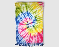 Light and breathable sarong. Hand-cut and dyed from Indonesia. Opens to 60"x40". 100% rayon material. Colors may vary from picture depending on cut of fabric. Yellow Tie Dye, Yellow Tie, Pink Green Yellow, Yellow Ties, White Tie, Sarong, Green Yellow, Tie Dye Top, Tie Dye Skirt