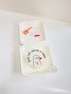 two plastic plates with stickers on them that say i love you and the other one has an image of a ghost