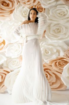 White Pleated Floor-length Dress, White Pleated Back Dress For Party, White Maxi Dress With Pleated Back, White Maxi Dress With Pleated Bodice, Feminine White Pleated Maxi Dress, White Off-shoulder Maternity Dress, Elegant Flowy Maternity Dress For Party, Spring Party Maternity Dress In Chiffon, Chiffon Maxi Maternity Dress For Wedding