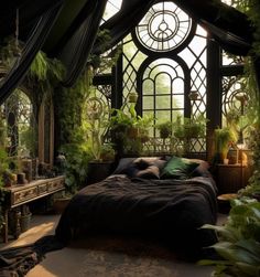 a bed sitting under a large window covered in lots of green plants and greenery