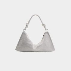 Cult Gaia "Hera" shoulder bag in allover shimmery rhinestones. Knotted shoulder strap, 10" drop. Zip top closure. Fabric lining. Item weight: 0.6 lbs. 5"H x 14"W x 4"D. Imported. Elegant Rectangular Hobo Bag For Parties, Elegant Crossbody Hobo Bag For Party, Evening Shoulder Bag, Elegant Party Baguette Clutch Bag, Elegant Evening Hobo Bag, Luxury Hobo Shoulder Bag For Party, Chic Hobo Shoulder Bag For Party, Party Shoulder Bag With Detachable Silver Strap, Elegant Handheld Hobo Bag For Evening