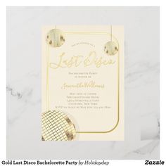 a white and gold party card with disco balls