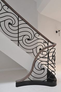 a black and white spiral stair railing in a house