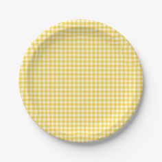 a yellow and white checkered paper plate