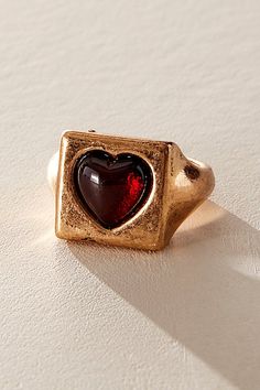 Add the sweetest little something to your jewelry collection with this stunning ring featuring a heart-adorned square on a subtly distressed metal band for a true lived-in, vintage-inspired look. | Running On Love Ring by Free People in Gold, Size: US 8 Free People Running, Harry Styles Jewelry, Vintage Heart Jewelry, Graduation Rings, Origami Jewelry, Costume Rings, People Running, Chunky Rings, Rings Cool