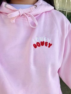 An embroidered 'Lovey dovey' hoodie! A super cute and multi-colour design that stands out on the front of the hoodie For the perfect oversized look, I would recommend sizing up one size than your regular as the hoodies run on the smaller side. The hoodies are 50/50 cotton and polyester. They're the perfect mid-weight for a soft and comfy, all-year round hoodie. Made by a 19-year-old entrepreneur! All packaging is eco-friendly and 100% recycled. Oversized Look, Colour Design, Lovey Dovey, Cherry Bomb, Quarter Zip Sweatshirt, Zip Sweatshirt, Egift Card, 50 50, Short Tops