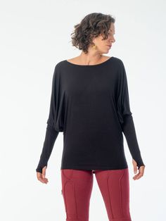 Relaxed and effortless, our lightweight long sleeve has dolman sleeves and a wide neckline. It narrows at the hips creating a flattering shape. [#details] Loose silhouette Extra-long sleeves Thumbholes One Size (O/S) [/details] [#fabric] Lightweight Rayon Lycra: 90% Rayon (Viscose) / 10% Spandex (Lycra) [/fabric] Versatile Long Sleeve Top With Thumbholes For Fall, Versatile Relaxed Fit Long Sleeve Top For Everyday, Slouchy Tops For Loungewear, Slouchy Batwing Sleeve Tops For Fall, Versatile Batwing Sleeve Tops For Layering, Versatile Stretch Long Sleeve Top For Everyday, Fall Stretch Tops With Batwing Sleeves, Fall Stretch Batwing Sleeve Tops, Fall Batwing Sleeve Versatile Tops