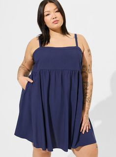 FIT Model is 5'11” wearing size 2. . Measures 40” from shoulder (size 2). MATERIALS + CARE Washable challis woven fabric. 72% viscose, 28% lyocell. Machine wash cold. Line dry. Imported. DETAILS Straight neckline. Sleeveless. Functional pockets. . The best plus size women's mini challis sleeveless sundress dresses in medevial blue made of washchallis. This spring dress or summer dress is perfect for Easter, for Mother's Day, to wear as a wedding guest, for brunch, for graduation, and for every d Summer Rayon Sundress With Adjustable Straps, Day Out Dress With Adjustable Straps In Rayon, Sleeveless Relaxed Fit Summer Dress, Flowy Midi Dress With Straight Neckline For Summer, Summer Casual Viscose Mini Dress, Sleeveless Viscose Mini Dress For Beach, Flowy Sleeveless Sundress With Adjustable Straps, Casual Sleeveless Rayon Mini Dress, Sleeveless Viscose Dress With Adjustable Straps