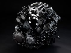 the engine of a car on a black background