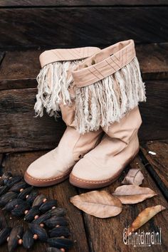 Beige Boho Vegan Shoes for Women  Our all time favorite cotton canvas   vegetarian boots also got Alma Libra Fringe upgrade! They are still same   very comfortable high boots with durable flat sole, that fit just   perfect and make your legs look slimmer, but now they also come with   gorgeous Long Linen Fringe decoration! The best part of it – the fringes   are removable! Bohemian Fall Boots With Flat Heel, Bohemian Closed Toe Boots For Spring, Spring Bohemian Boots With Fringe, Bohemian Fringe Boots With Round Toe, Bohemian Style Fringe Boots With Round Toe, Bohemian Boots With Flat Heel For Festival, Winter Festival Boots With Closed Toe, Spring Canvas Boots With Round Toe, Brown Canvas Boots With Round Toe