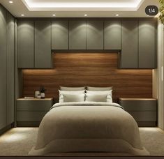 a large bed sitting under a wooden headboard in a bedroom