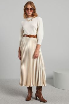 Long skirt with flowing silhouette in a luxe pleated satin, elasticated waist and a side zip fastening. Champagne Pleated Skirt Outfit, Pleated Satin Skirt Outfit, Champagne Outfit, Pleated Satin Skirt, Satin Pleated Skirt, Satin Skirt Outfit, Mocha Mousse, Pleated Skirt Outfit, Spring Wedding Guest