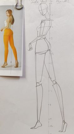 a drawing of a woman's body is shown next to a pair of scissors