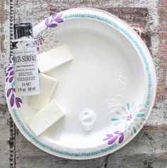 a white plate with some soap on it