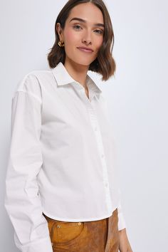 A classic shirt goes for miles in your wardrobe and this White Jasper Button Down is no exception. Polished details like double fused collar, scalloped side slit, center back box pleat, and long sleeves with cuff and placket for easy roll up, this cropped silhouette is a styling winner! For business or pleasure, wear it tucked or loose, this effortlessly polished piece is great for year round wear thanks to its versatile styling options. Double fused collar Long sleeves with cuff and placket for White Jasper, Easy Rolls, Box Pleats, White Crop, Classic Shirt, Button Placket, Roll Up, White Long Sleeve, Stripes Design