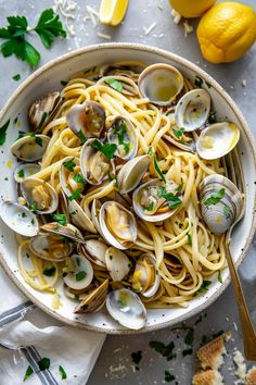 pasta with clams and parsley in a bowl