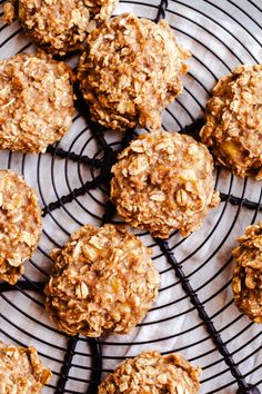 cookies cooling on a wire rack with oatmeal toppings in the middle