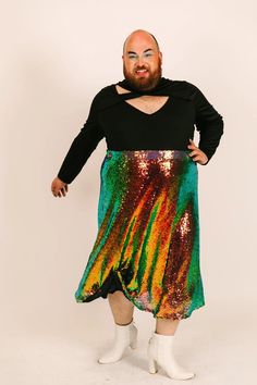 Introducing the Sequin Swing Skirt – where style meets sparkle and comfort meets glam! The elastic waist makes the garment comfortable and easy to wear. Dress the skirt up or down, it will fit easily into your wardrobe. Whether you're looking to make a statement at a party, add a touch of glam to your everyday life, or simply spread a little extra joy wherever you go – this skirt has got your back (and your twirl)! Because life's too short to blend in when you were born to stand out – and sparkl Sequin Tulle Skirt, Asymmetrical Skirt Bottoms For Party In Multicolor, Iridescent Sequin, Life's Too Short, At A Party, Wedding Guest Looks, Got Your Back, Funky Fashion, Frozen 2