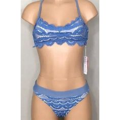 Pilyq Sky Blue Lace Swim Top Bottoms Color: Blue Size: Small High-Waisted Bottom Bralette With Lace Solid Pattern Back Hand Wash Only New With Tags Blue Fitted Underwire Tankini, Blue Bra-friendly Tankini For Poolside, Blue Seamless Tankini For Beach Party, Blue Bra Friendly Tankini, Blue Seamless Tankini For Beachwear, Blue Bra-friendly Tankini, Blue Stretch Swimwear With Bra Friendly Feature, Blue Stretch Swimwear With Bra Friendly Design, Blue Stretch Swimwear With Bra-friendly Design