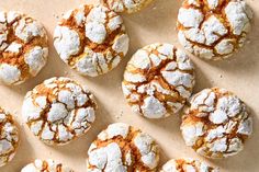 several powdered sugar covered pastries are arranged on a counter top, ready to be eaten