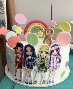 a birthday cake with three girls on it