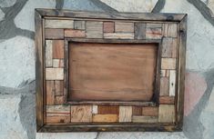 an old wooden frame with wood squares on it