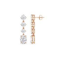 These diamond danglers exude a sense of sophistication and ease. They look relaxed and refined at once with their linear design and subtle movement. Each earring features a trio of round diamonds set in a vertical row and punctuated by a larger oval-cut diamond at the end. This elegant pair is the perfect choice when you want to dress to impress yet still be comfortable. Modern Diamond Earrings For Formal Occasions, Modern Elegant Diamond Earrings For Formal Occasions, Modern Oval Diamond Earrings With Prong Setting, Modern Linear Earrings With Diamond Accents For Formal Events, Modern Cubic Zirconia Linear Earrings For Formal Occasions, Modern Linear Earrings With Diamond Accents For Formal Occasions, Modern Rose Gold Linear Earrings For Formal Occasions, Classic Diamond White Linear Earrings For Formal Occasions, Classic Diamond White Linear Earrings For Formal Events