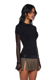 This polo inspired top has a stretchy knit construction, a collared neckline, short sleeves, and front button closures. Black Stretch Collared Top, Trendy Black Top With Collared Neckline, Black Collared Top For Fall, Chic Fitted Top With Polo Collar, Fitted Collared Polo Shirt For Fall, Stretch Collared Top For Night Out, Trendy Collared Top With Seamless Collar, Black Collared Top For Night Out, Black Fitted Tops With Collared Neckline