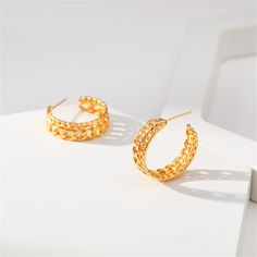 Goldtone huggie earrings featuring a unique layered design. 0.31'' W x 0.98'' diameter Goldtone copper Layered Design, Huggie Earrings, Cards Sign, Curb Chain, Layers Design, Huggies Earrings, 18k Gold, Gold Tones, Gold Plate