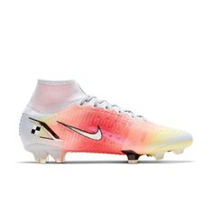 the nike vapor soccer shoe is shown in white and pink tones, with black accents