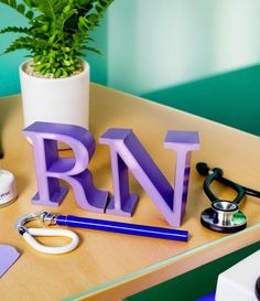 Add a touch of pride and personality to your workspace with this beautifully 3D-printed "RN" desk decor! Standing at approximately 4.5 inches tall and 8.25 inches wide, this sleek and modern design is perfect for any nurse's desk, shelf, or office. Whether you're treating yourself or looking for a thoughtful gift for the nurse in your life, this minimalist yet bold decoration serves as a constant reminder of the dedication and hard work nurses put in every day. Durable and lightweight, the "RN" letters are carefully crafted from high-quality plastic, making them a great addition to any nursing workspace. Whether at home, in the office, or in the breakroom, this piece adds a professional yet personal touch. Nurse Desk, Desk Shelf, The Nurse, Break Room, Office Decoration, Holiday Deals, Desk Decor, Nurse Gifts, Hard Work