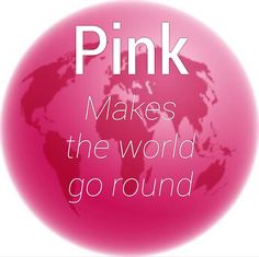 a pink button with the words pink makes the world go round in front of it