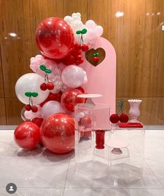 balloons, vases and other items are on display