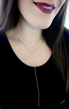 14K 9K Gold Lariat Necklace, Solid Gold Y necklace, Teardrop gold necklace, Minimal Dainty gold necklace, Women Gift, Bridesmaid necklace, Simple lariat gold necklace, Rose gold lariat necklace, FREE EXPRESS SHIPPING A delicate 14K or 9K solid gold teardrop lariat Y necklace. Wrap the necklace around your neck and simply pass the small teardrop though the bigger teardrop and adjust the length as you please. Whisper...Sexy Elegance! ------------------------------------------- D E T A I L S 14K So Dainty 14k Gold-filled Lariat Necklace For Everyday, Dainty Teardrop Lariat Necklace Gift, Dainty Lariat Necklace With Teardrop Pendant And Adjustable Chain, Dainty Teardrop Lariat Necklace With Adjustable Chain, Dainty Teardrop Pendant Lariat Necklace, Teardrop Lariat Necklace With Delicate Chain As Gift, Teardrop Lariat Necklace With Delicate Chain For Gifts, Yellow Gold Lariat Charm Necklaces As Gift, Yellow Gold Lariat Charm Necklace For Gift