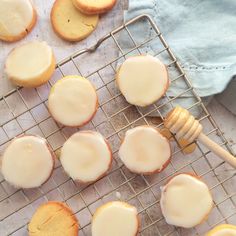 iced cookies with icing and honey on a cooling rack