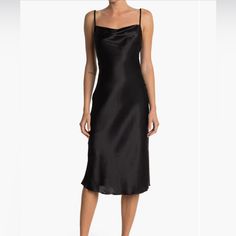 Slip Into A Cowl Neck Midi Dress Constructed From Glossy Satin For The Perfect Date-Night Look. 46" Length (Size Xs) Cowl Neck Sleeveless Adjustable Straps Slips On Over Head 100% Polyester Hand Wash, Line Dry Made In The Usa Of Imported Fabric Model Stats: 5'10", 32" Bust, 25" Waist, 36" Hip. Model Is Wearing Size Xs. Elegant Fitted Midi Dress For Night, Chic Fitted Midi Dress For Night, Chic Fitted Dress For Night, Fitted Sleeveless Midi Dress For Night, Fitted Spaghetti Strap Midi Dress For Night, Fitted Satin Midi Dress For Night, Fitted Midi Dress For Night, Fitted Satin Midi Dress For Night Events, Knee-length Black Slip Dress For Date Night