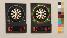 two darts are on the back of an electronic dart board with neon lights around it