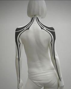 a white mannequin with black lines on it's back