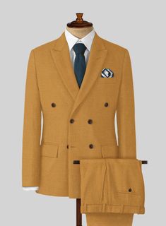 Give rustic shade suit a break and add try something fancy with our Naples Yellow Tweed Double Breasted Suit. Crafted from wool, the suit will make sure that you just wont't stand out of the crowd but also as the most debonair chap at the party. Wear over a button-down shirt, tailored trousers and brogues for a striking smart look. 
 
Look Includes   Naples Yellow Tweed Fabric  Double Breasted Jacket Style  Peak Lapel  Horn Brown Buttons  Single Vent  Three Cuff Buttons  Two welted back pockets Brown Wool Suits With Suit Collar, Wool Suit With Suit Collar For Fall, Fall Wool Suit With Suit Collar, Wool Suits With Suit Collar For Fall, Wool Suits For Fall, Fall Wool Suits, Tailored Wool Suits For Fall, Tailored Brown Tweed Suits, Tweed Three-piece Business Suit For Fall