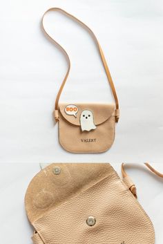 the small purse has a ghost on it